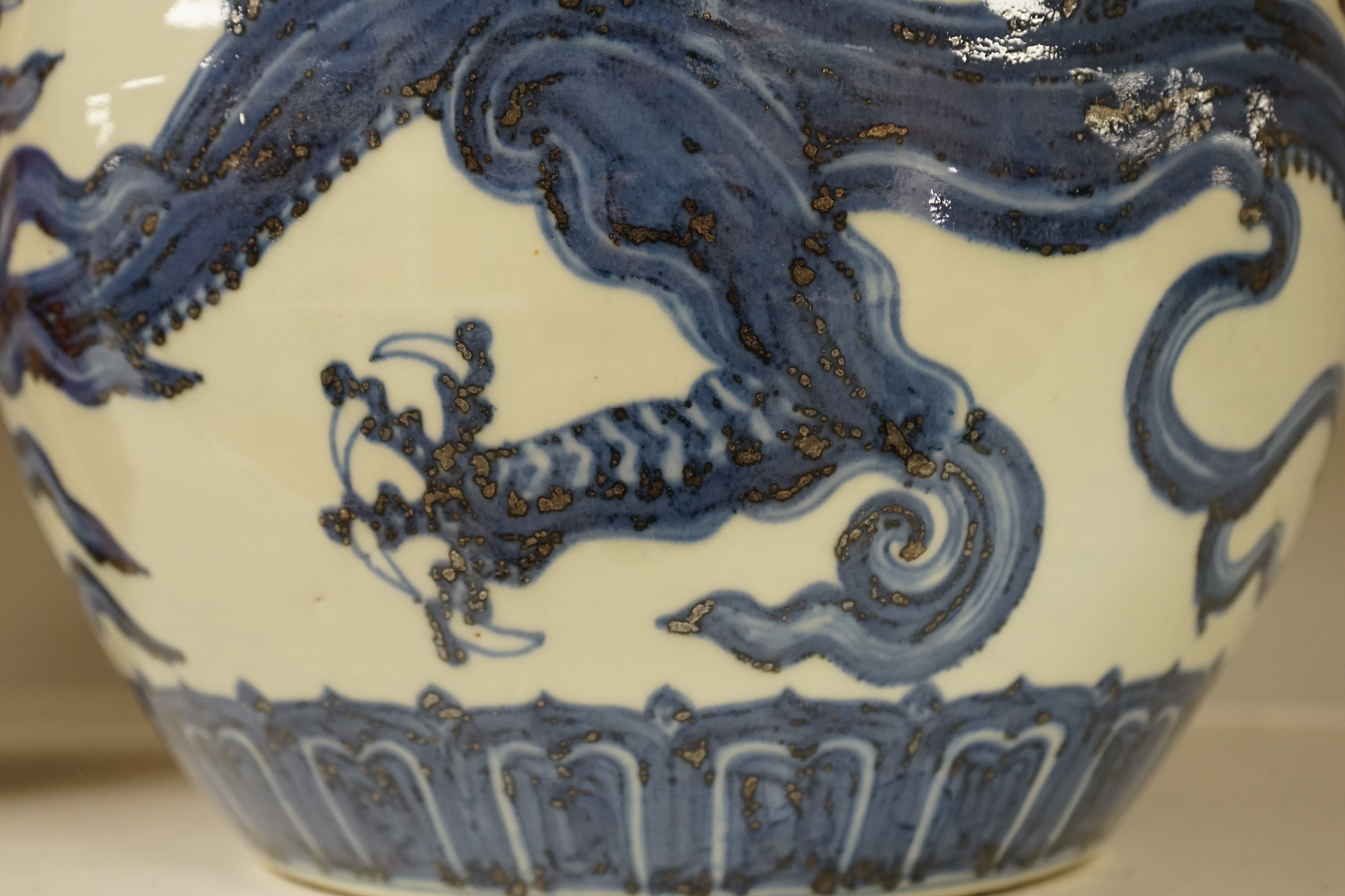 A Chinese large blue and white ‘dragon’ jar, 29cm. Condition - good